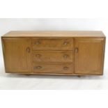 Ercol model 455 Windsor sideboard, in elm. With 3 drawers (inc. cutlery insert) & 2 cupboards. W156c