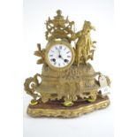 French style figural gilt mantle clock, with stand, pendulum & key, 35cm high including stand