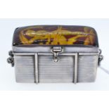 Silver & amber trinket box, the amber top carved with a classical maiden, 5.5cm wide, 40.82 grams