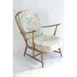 Ercol 203 Windsor easy chair, natural finish. W71cm D89cm H85cm seat height 38cm (with cushion)