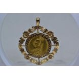 1887 Victoria (Old Head) full sovereign in 9ct gold mount, gross weight 15.38 grams