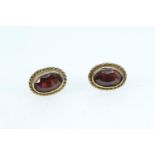 Pair of 9ct gold & garnet ear studs, length 13mm, gross weight 3.25 grams