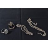 34 grams of silver jewellery, including three rings & two neck chains, one neck chain with clasp AF