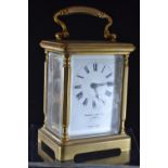 French brass cased carriage clock, retailed by Mappin & Webb, with key, height inc. handle 14.5cm, t