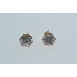 Pair of 9ct gold & white stone ear studs, gross weight 0.92 gram