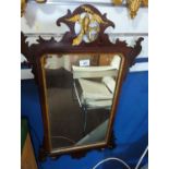 Georgian mahogany framed mirror with carved detail and gilt winged phoenix 36cm x 77cm