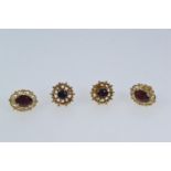 Two pairs of 9ct gold & garnet ear studs, gross weight 3.75 grams