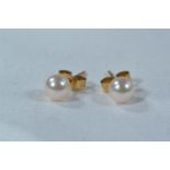 Two pairs of 9ct gold & gem set ear studs, gross weight 1.8 grams