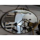 Vintage oval bevelled mirror with fine gilt frame 69cm wide