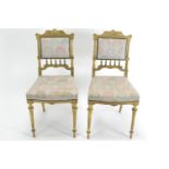 Pair of Italian Neoclassical style gilt hall chairs, with tapered fluted legs, and later reupholster