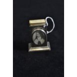 Silver table match box holder with photo frame, maker GY & Co, Chester 1911, height 7cm, weighted, g