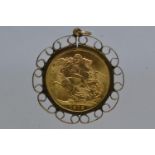 1912 George V full sovereign in 9ct gold mount, gross weight 10.38 grams