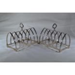 Pair of silver toast racks, maker OT & BD, London 1925 & 1927 respectively, width 11.2cm, gross weig