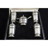 Cased silver cruet set, maker EV, Sheffield 1940, comprising pair of pepperettes, pair of salt shake