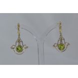 Pair of 9ct gold & green stone pendant earrings, length 35mm, gross weight 3.44 grams