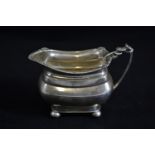 Silver milk jug, maker's mark rubbed, Sheffield 1961, 15cm wide, 268 grams
