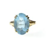 9ct gold ring claw-set with an aquamarine coloured stone, size L, 2.6 grams