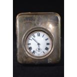 Silver fronted watch stand, maker's mark rubbed, Birmingham 1907, 13cm high, laurel motif & inscript