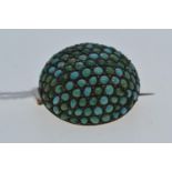 9ct gold, white metal & turquoise brooch, of bombé design, reverse stamped 'K9', diameter 25mm, with