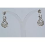 Pair of 9ct white gold & diamond pendant earrings, length 22mm, gross weight 2.32 grams