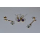 Two pairs of 9ct gold & gem set pendant earrings, set with amethyst & blue stone respectively, lengt