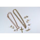 7.19 grams of 9ct gold inc. two chains, cross pendant, pair of earrings & a single earring, together