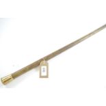 15ct gold mounted walking cane, engraved armorial & initials to top, overall length 86cm, crack to g