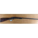 Antique flintlock rifle, overall length 117cm, losses & worm damage
