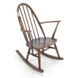 Ercol 428 Windsor Quaker Rocking Chair. Traditional (dark) finish. width 69cm d71cm h85cm seat heigh