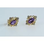 Pair of 14ct gold, amethyst & diamond earrings, one butterfly 9ct gold, gross weight 1.85 grams