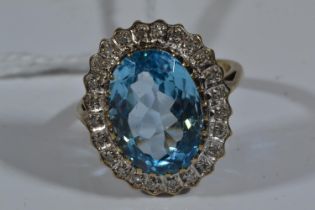 9ct gold, 6.64 carat blue topaz & diamond ring, size L, 4.95 grams 
