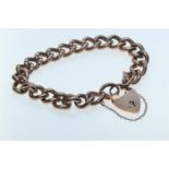 9ct gold curb link bracelet with heart-shaped padlock, 17 grams