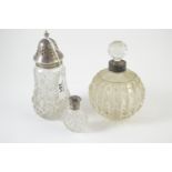 Three silver & cut glass items, various maker's & dates: a sugar sifter, 15cm high & two scent bottl