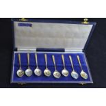 Cased set of six silver gilt & enamel coffee spoons, maker C & C, Birmingham 1966, each bowl decorat