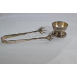 Pair of Hong Kong silver tongs & a small Chinese Wai Kee silver condiment dish, gross weight 140 gra