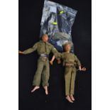 Two 1970's Palitoy Action Man figures, both with blonde flock hair and 'eagle eyes', together with a