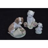 Lladro dogs inc. 'Utopia', 'Collectors Society' and one other, height of tallest 11.5cm