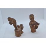 Oriental small carved wooden figures (both have moving parts). height of tallest 8cm