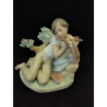 Lladro Student Flute Player, height 20cm