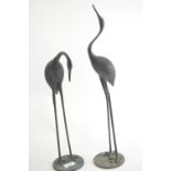 Pair of bronzed stylized crane sculptures, tallest 53cm
