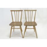 2x Ercol model 391 all purpose Windsor chairs. Natural finish, in beech and elm.