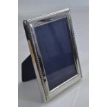 Rectangular silver photo frame, maker RC, Sheffield 1989, overall 11.8x15.7cm