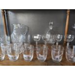 Collection of Queen Lace crystal glassware engraved with African wildlife; includes six tumblers, si