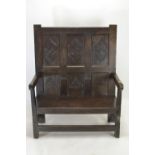 C18 oak & elm carved high back settle. W107cm H132cm D51cm