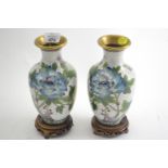 Pair of cloisonné vases on stands depicting chrysanthemums and butterflies, height inc. stand 24cm
