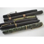 Five fountain pens with 14ct gold nibs together with one missing a nib but with 9ct cold banding. In