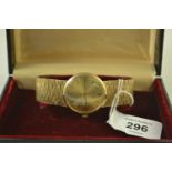 Longines 9ct gold cased wristwatch, with integral 9ct white gold strap, case diameter 33mm, with a L