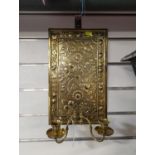 Polished brass candle sconce, height 45.5cm x width 23cm