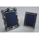Two rectangular silver photo frames, makers RC & DP, Sheffield 1990 & 1986 respectively, overall 10.