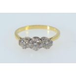 18ct gold & three stone diamond ring, the centre stone weighing approx. 0.50 carat, size R, 3.55 gra